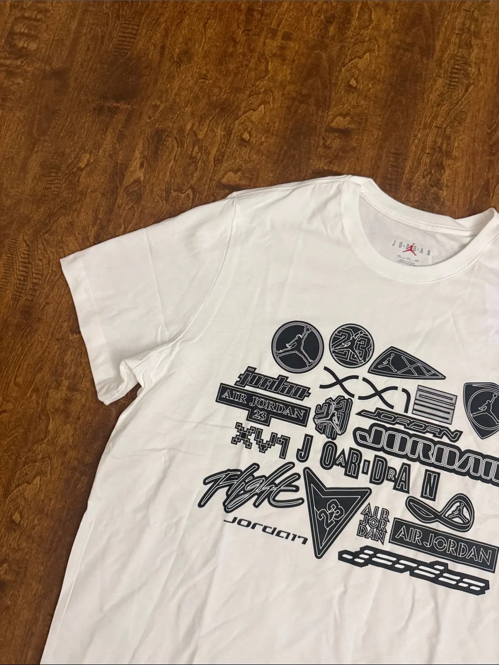 Jordan White Short-Sleeve Tee with Navy Logo Collage